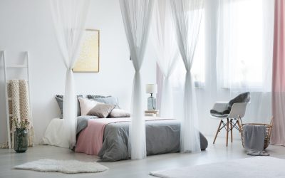 Balanced and calm interior design of scandinavian bedroom with comfortable double bed and soft accessories